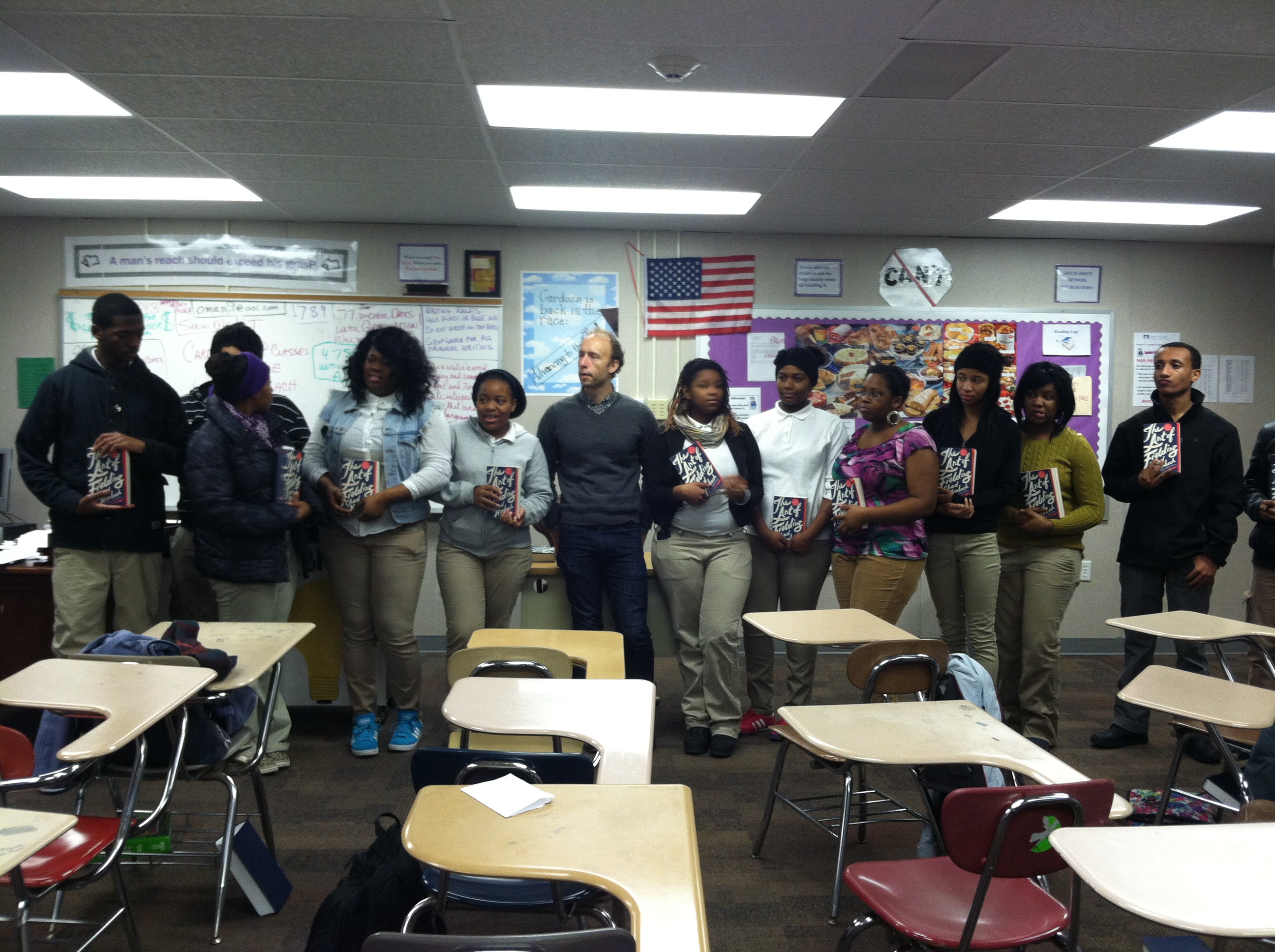 Author Chad Harbach poses with students from Cardozo High School.