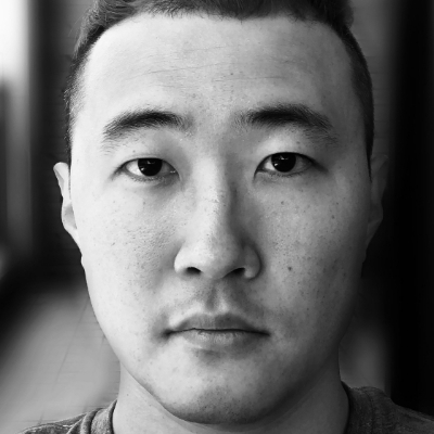 Black and white headshot of author Matthew Salesses, an Asian man