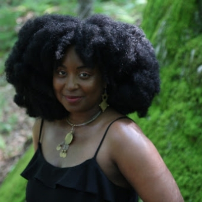 Headshot of Sheree Renée Thomas, a Black woman wearing gold jewelry and a black sleeveless top