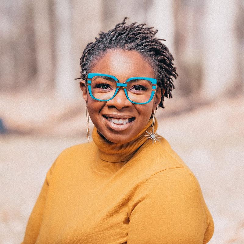 PEN/Faulkner's logo is a dark red circle with a white illustrated feather through the center