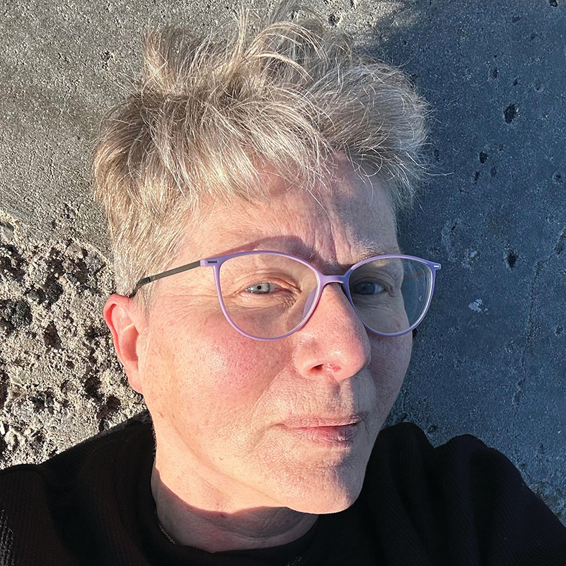 PEN/Faulkner's logo is a dark red circle with a white illustrated feather through the center