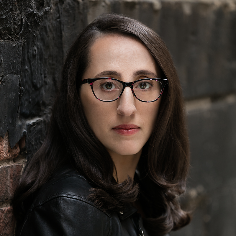 PEN/Faulkner's logo is a dark red circle with a white illustrated feather through the center