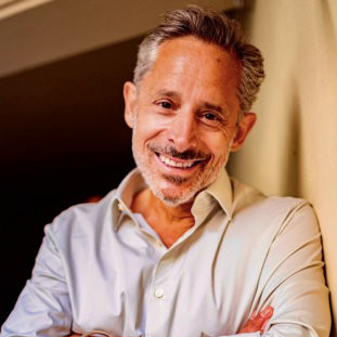 PEN/Faulkner's logo is a dark red circle with a white illustrated feather through the center