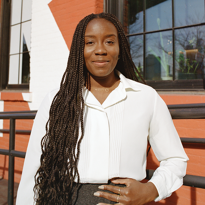 PEN/Faulkner's logo is a dark red circle with a white illustrated feather through the center