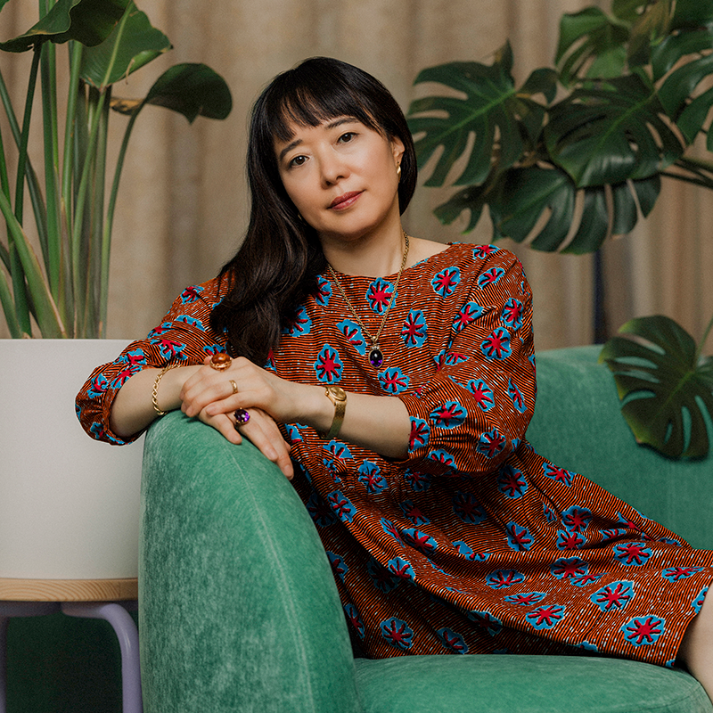 PEN/Faulkner's logo is a dark red circle with a white illustrated feather through the center