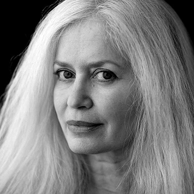 Black and white headshot of author Amy Hempel, a White woman