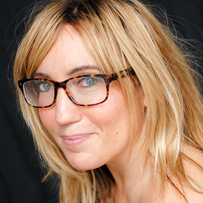 Headshot of author Caroline Kepnes, a White woman with glasses