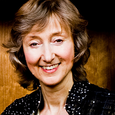 Headshot of Deborah Tannen, a White woman with short hair in a black top