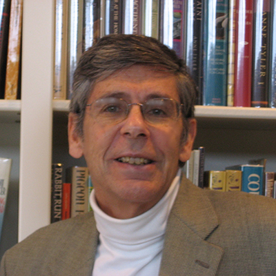 Headshot of Jackson R. Bryer, a White man wearing glasses and a gray blazer